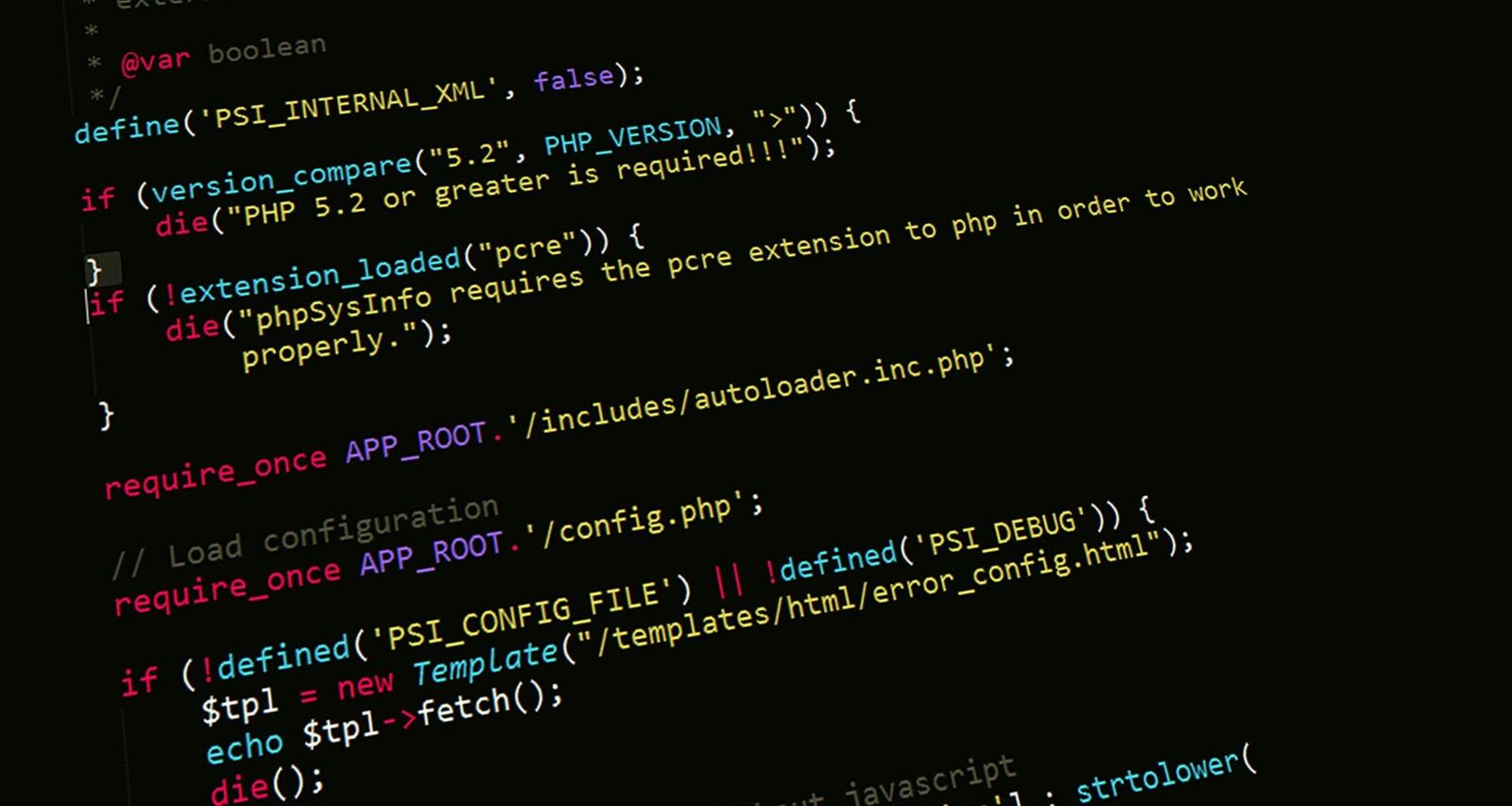 Close-up of PHP code on a screen, with highlighted syntax against a dark background.